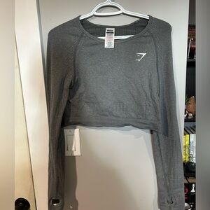 Gymshark cropped workout top.